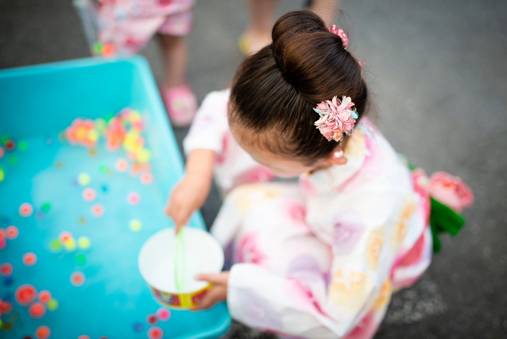 Girl wearing a yukata enjoy the summer festival in Japan